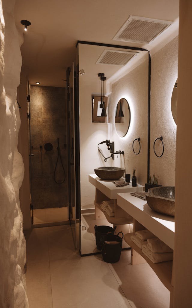 Luxurious bathroom in a Greek boutique hotel with modern design elements.